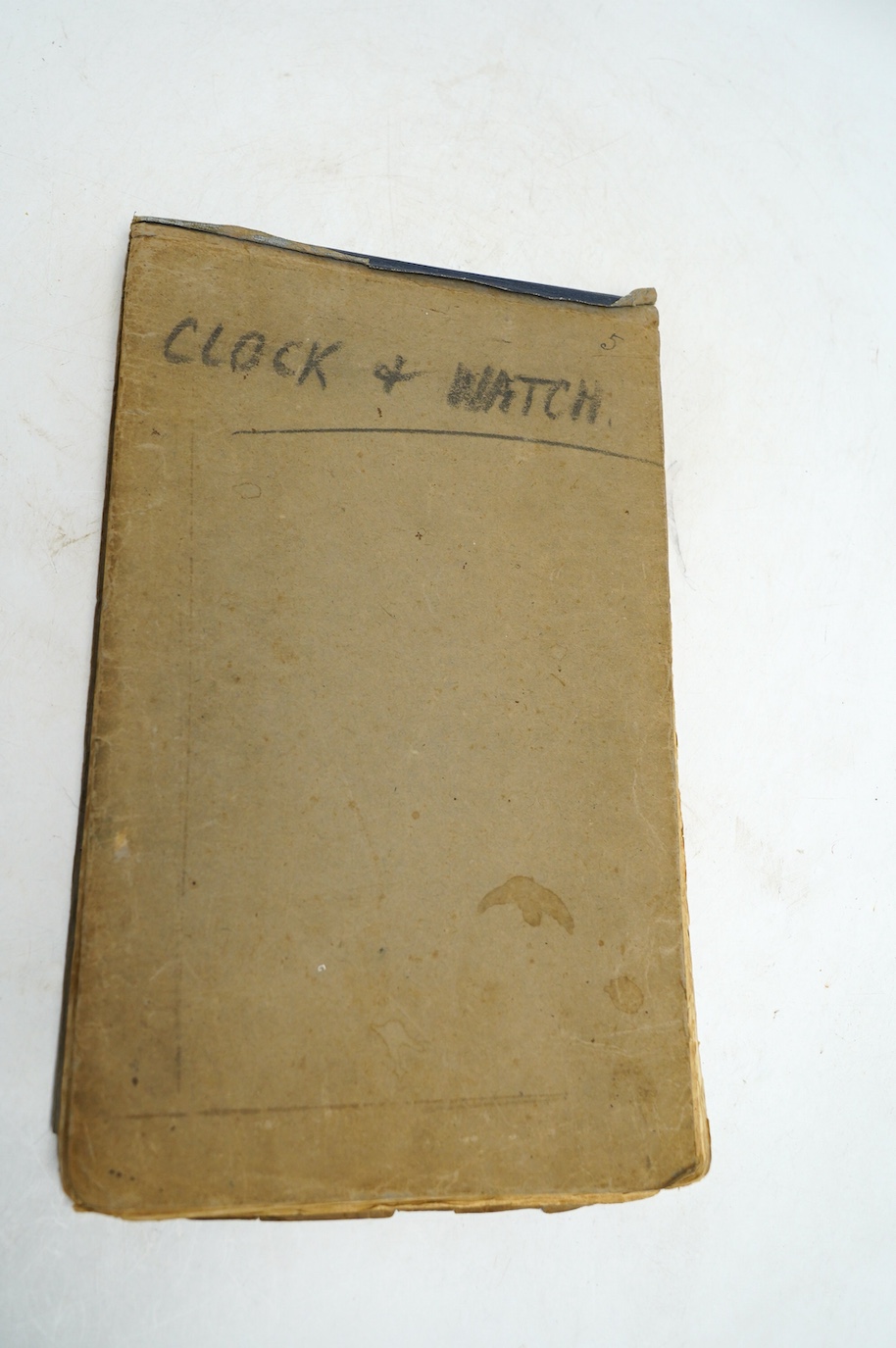 A collection of watch parts, tools and a small selection of costume jewellery, housed in two cases, together with two books. Condition - poor to fair